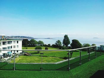 Scenic view of landscape against blue sky