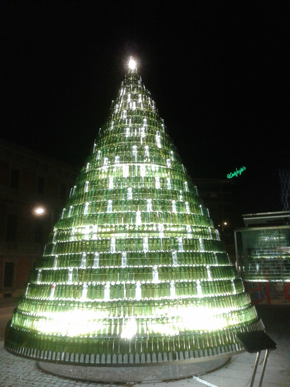 illuminated, christmas tree, christmas lights, christmas, night, christmas decoration, celebration, low angle view, no people, tree topper, tree, christmas ornament, sky, architecture, outdoors