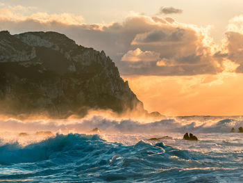 Scenic view of sea against sky during sunset