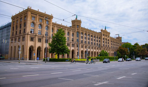 People walking on street in city