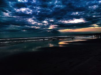 Scenic view of sea against sky at sunset