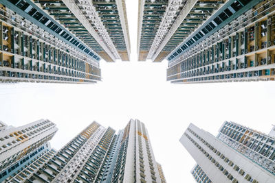 Low angle view of modern buildings against sky