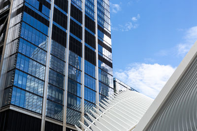 Low angle view of modern buildings against sky