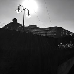 Low angle view of woman against sky