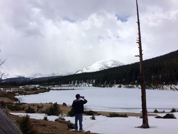 Scenic view of snow covered mountains