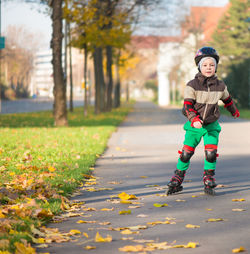 Full length of boy skating at park