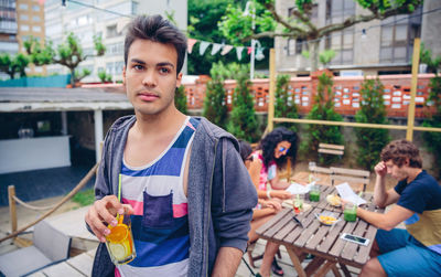 Man having juice at restaurant