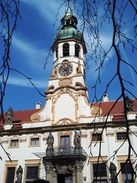 Low angle view of building against blue sky