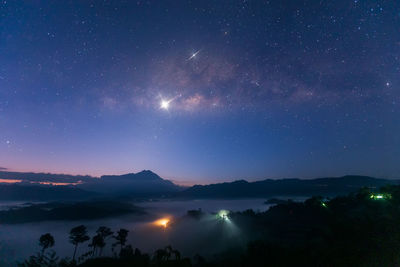 Scenic view of star field against sky at night