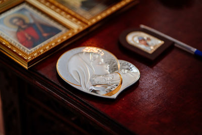 High angle view of coins on table