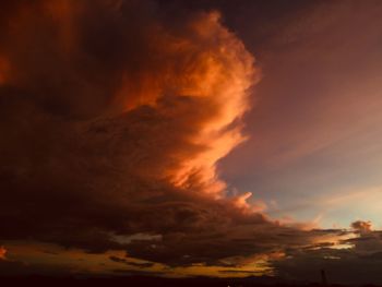 Low angle view of dramatic sky during sunset