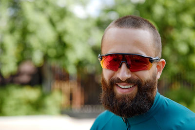 Portrait of young man wearing sunglasses