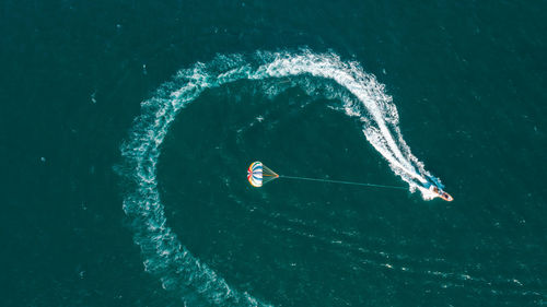 High angle view of people on boat in sea