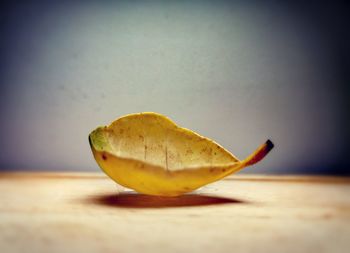 Close-up of lemon on table