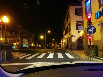 Illuminated street light at night