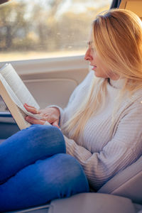 Young woman using phone