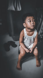 Portrait of a girl sitting at home