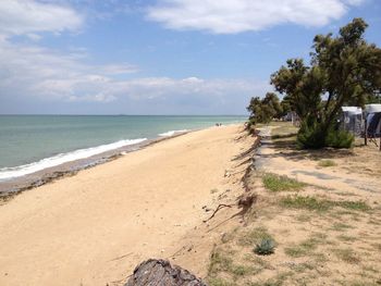 Scenic view of beach against sky