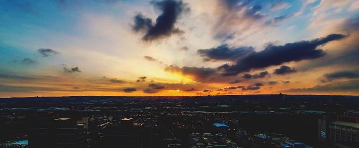 High angle view of townscape against sky during sunset