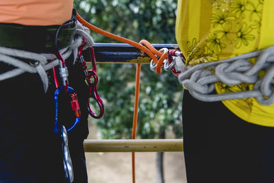 Rappel practitioners preparing the equipment to perform the activity next. salvador bahia brazil.