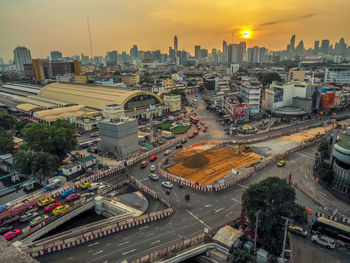 High angle view of buildings against sky during sunset