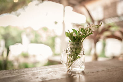 Close-up of glass jar on table