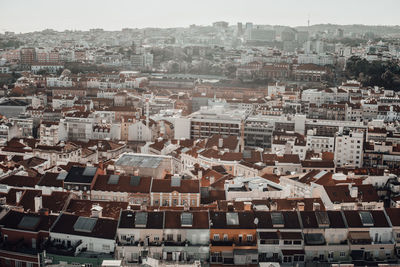Rooftop aerial view of lisbon city: residential district, tiled roofs