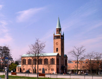 View of clock tower against blue sky