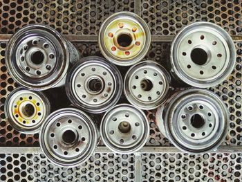 Directly above shot of sewing items on metal grate