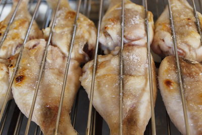 High angle view of seafood on barbecue grill