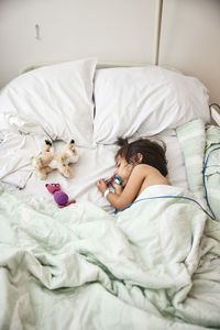 Girl sleeping in hospital bed