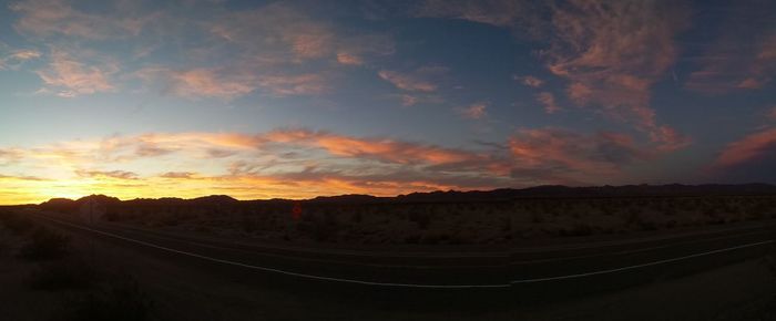 Scenic view of landscape at sunset