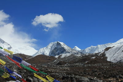 Prayer flags on snowcapped mountains of nepal