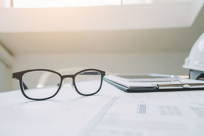 Close-up of eyeglasses on table