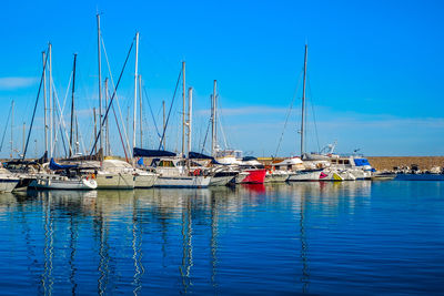 Yachts docked in sea port