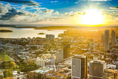 High angle view of buildings against sky during sunset