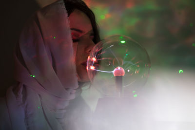 Woman holding crystal ball