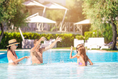 Group of people at swimming pool