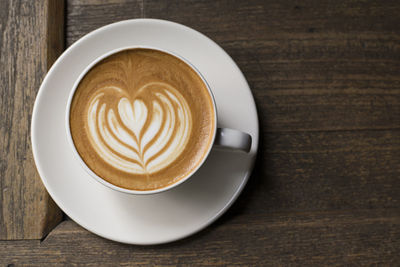 High angle view of cappuccino on table