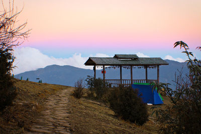 Scenic view of beach against sky during sunset