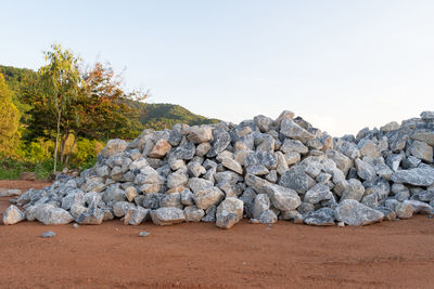 Rocks on land against sky
