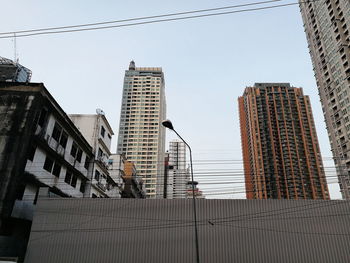 Low angle view of office building against sky