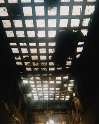 Low angle view of silhouette ceiling in building