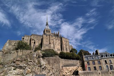 Low angle view of historic building against sky