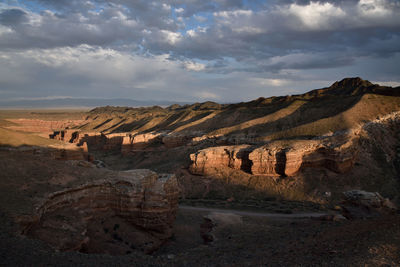 Panoramic view of ruins of mountain against cloudy sky