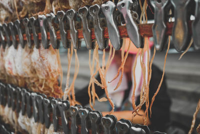 Close-up of fish drying outdoors