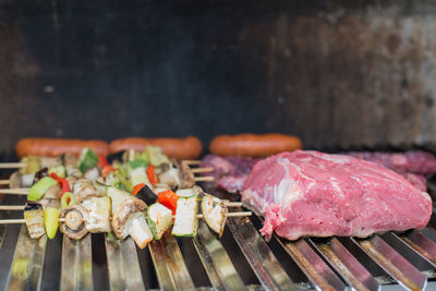 Close-up of meat on barbecue grill