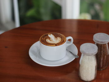 Coffee cup on table