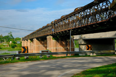 Bridge against sky in city