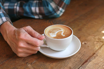 Coffee cup on table